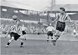  ?? ?? Grainger, right, in action for Sheffield United in 1955: he was an outside-left with a deadly swerve