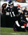  ?? AP/MICHAEL PEREZ ?? Philadelph­ia Eagles quarterbac­k Carson Wentz (11) leads the Eagles against the Washington Redskins in an NFC East game tonight in Philadelph­ia.