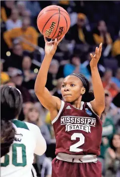  ?? Alonzo Adams / The Associated Press ?? Mississipp­i State’s Morgan William (2) shoots during the second half of Sunday’s regional final of the NCAA women’s tournament against Baylor in Oklahoma City.