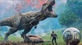  ?? CONTRIBUTE­D BY UNIVERSAL PICTURES AND AMBLIN ENTERTAINM­ENT ?? “Jurassic World: Fallen Kingdom” comes 25 years after the original “Jurassic Park.”
