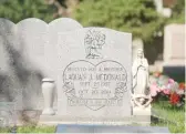  ??  ?? Laquan McDonald’s grave is shown in “City So Real.”