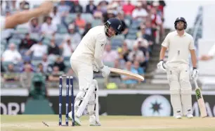  ?? AP ?? England’s Bairstow falls to Australia’s Josh Hazlewood on the final day of the third Test in Perth. —
