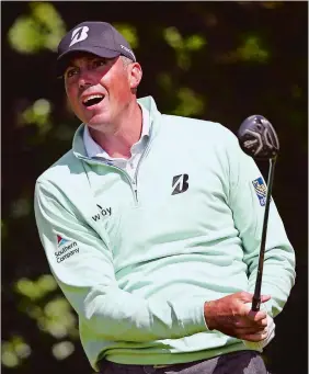  ?? DAVE THOMPSON/AP PHOTO ?? Matt Kuchar of the United States plays a shot off the 5th tee during the first round of the British Open Golf Championsh­ip on Thursday at Royal Birkdale, Southport, England. Kuchar shares the lead with fellow Americans Jordan Spieth and Brooks Koepka.