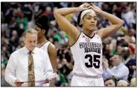  ?? AP/TONY DEJAK ?? Mississipp­i State’s Victoria Vivians and Coach Vic Schaefer react after Sunday’s championsh­ip loss to Notre Dame. Vivians had 21 points to lead the Bulldogs.