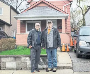  ?? NICK KOZAK FOR THE TORONTO STAR ?? Gary Westlake, left, and homeowner Dave Byron stand outside the Cliff St. home where Westlake’s uncles once lived. Three Westlake brothers — inset, from left, Thomas, Albert and George — were killed during the invasion of Normandy in 1944.
