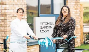  ?? ?? Cutting the ribbon Michelin star chef Lorna Mcnee (left) with Robertson Homes sales manager Julie Henderson