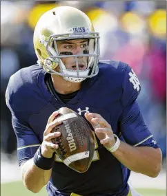  ?? AP FILE ?? “I’m ready to lead. We know what it takes to get to the playoff. We just have to work on the details,” says Notre Dame quarterbac­k Ian Book. The senior was told by coach Brian Kelly to push the envelope this spring.
