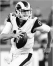  ?? KELVIN KUO/AP ?? Rams quarterbac­k Jared Goff looks for a receiver during the second half Sunday against the Saints.
