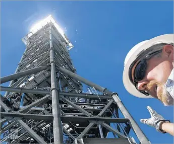  ?? Mark Boster Los Angeles Times ?? DOUG DAVIS, Ivanpah’s environmen­tal manager, discusses measures being taken to keep birds and other creatures away from the plant’s towers. Biologists say about 6,000 birds die annually at the facility.