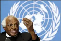  ?? SALVATORE DI NOLFI — KEYSTONE VIA AP ?? South Africa’s Desmond Tutu, Archbishop and Nobel Peace Prize laureate, reacts about Israel blocked Tutu’s UN mission to Beit Hanun, during a press conference at the United Nations in Geneva, Switzerlan­d, Monday, Dec. 11, 2006. South Africa’s Nobel Peace Prize-winning activist for racial justice and LGBT rights and retired Anglican Archbishop of Cape Town, has died, South African President Cyril Ramaphosa announced Sunday, Dec. 26, 2021. He was 90.