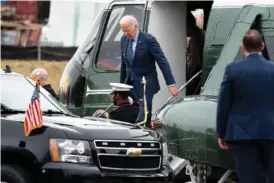  ?? AP PHOTO/ANDREW HARNIK ?? On Feb. 16, president Joe Biden arrives at Walter Reed National Military Medical Center in Bethesda.