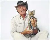  ?? ASSOCIATED PRESS FILE PHOTO ?? Wildlife advocate Jack Hanna poses for a portrait with a serval cub in New York on Oct. 12, 2015.