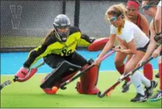  ?? GENE WALSH — DIGITAL FIRST MEDIA ?? Notre Dame midfielder Mia Leonhardt, right, tries to steer a shot past Germantown Academy goalie Hannah Santos during the 2017 PAISAA final. Leonhardt scored 20 goals and dished 23 assists for the 18-win Irish this season.