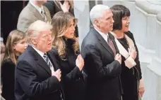  ?? POOL PHOTO BY OLIVIER DOULIERY ?? President Trump, first lady Melania Trump, Vice President Pence and his wife, Karen, attend a National Prayer Service at the Washington National Cathedral on Jan. 21.