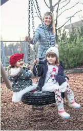  ??  ?? Gabriela Linck plays with her daughters, Olivia, 2, and Eduarda, 4, at the daycare at Langara College, where Gabriela is a marketing student.