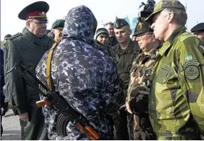  ??  ?? BLOCKED: Internatio­nal observers turned back by a pro-Russian soldier on Friday