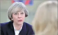  ?? JOHN STILLWELL / REUTERS ?? British Prime Minister Theresa May said on Sunday she will announce details of her Brexit plans this week.