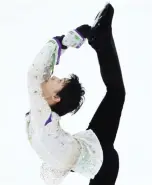  ??  ?? NAGANO: Yuzuru Hanyu of Japan performs during the men’s singles event at the ISU Grand Prix figure skating NHK Trophy in Nagano yesterday. — AFP