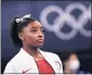  ?? LOIC VENANCE AFP VIA GETTY IMAGES ?? USA’s Simone Biles looks on after dropping out of the gymnastics women’s team final during the Tokyo 2020 Olympic Games on Tuesday.