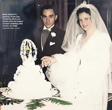  ?? KASDORF FAMILY PHOTO ?? Betty Kasdorf's parents, Frank and Catherine Wick, are shown with the topper on their wedding cake on Oct. 12, 1940.