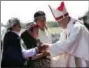  ?? ALESSANDRA TARANTINO - THE ASSOCIATED PRESS ?? Pope Francis greets Mapuches in an offertory of a Mass at the Maquehue Air Base, in Temuco, Chile, Wednesday, Jan. 17, 2018. Francis is urging the Mapuche people to reject violence in pushing their cause.