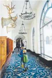  ?? Rachel Walker, for The Washington Post ?? Chateau Lake Louise feels like a small palace, with grand halls, ballrooms, chandelier­s, dramatic staircases and mounted game on the walls.