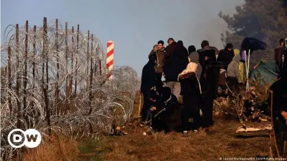  ?? ?? Мигранты на границе между Польшей и Беларусью