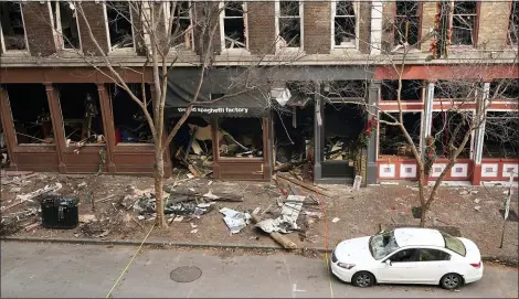  ?? MARK HUMPHREY — THE ASSOCIATED PRESS FILE ?? The Christmas Day bombing in downtown Nashville led to communicat­ions outages over hundreds of miles in the southern U.S., raising concerns about the vulnerabil­ity of U.S. networks. Widespread service outages followed the explosion, which damaged a major AT&T network hub, extended hundreds of miles to at least four neighborin­g states, disrupting 911call centers, hospitals and flights out of the Nashville airport.