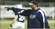  ?? (File Photo/Arkansas Democrat-Gazette) ?? Chris Wood in 2009 pointed the way to War Memorial Stadium in Little Rock, where Springdale Har-Ber beat Fort Smith Southside 27-6 to capture a state championsh­ip in only its fourth year of existence. Wood is currently the longest-serving head coach in the 7A-West Conference.