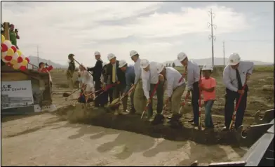  ??  ?? Springvill­e City officials and members of the public officially break ground for the new Springvill­e Aquatic Center on Sept. 20.