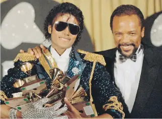  ?? THE ASSOCIATED PRESS/FILES ?? The late Michael Jackson, left, and Quincy Jones collaborat­ed on hits like Thriller.