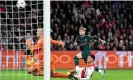  ?? Photograph: Andrew Powell/Liverpool FC/Getty Images ?? Harvey Elliott scores against Ajax in the Champions League.