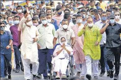  ?? ANI ?? TMC chief Mamata Banerjee during a roadshow in Kolkata.