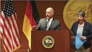  ??  ?? California Gov. Jerry Brown (left), expresses his belief that the United States will return to the global climate accord during a news conference Friday in San Francisco as German Federal Minister for the Environmen­t, Barbara Hendricks (right),...