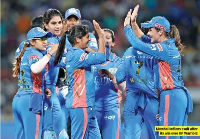  ?? ?? Mumbai Indians exult after its win over UP Warriorz