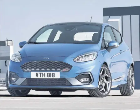  ??  ?? Ford dominated the best sellers list with the Fiesta, pictured above, and Focus leading the pack