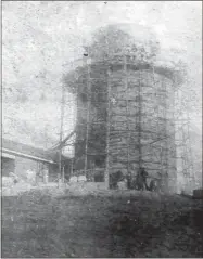  ?? Rome area history Center ?? This photo shows the water tank and brickwork under constructi­on in 1871. The structure was initially built as a water tower with just the brickwork around it. The clockworks were added later.