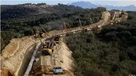  ??  ?? Прокладка Трансадриа­тического газопровод­а TAP в горах Албании