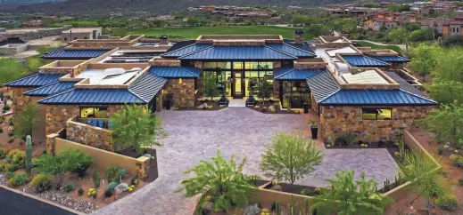  ?? COURTESY OF RUSS LYON SOTHEBY'S ?? Janet and Danny Dryer paid cash for a 6,900-square-foot house in north Scottsdale’s Desert Mountain, a record for the golf community. Janet Dryer is chair of Minneapoli­s-based Perforce Software.