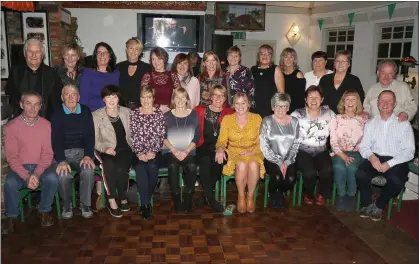  ??  ?? The All-Ireland winning Adamstown/Cloughbawn ladies’ football team of 1988 and their mentors at their 30-year reunion in The Cloch Bán, Clonroche.