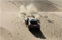  ?? Picture: HAMAD I MOHAMMED/REUTERS ?? DUNE DUST: Bahrain Raid Xtreme’s Sebastien Loeb and co-driver Fabian Lurquin during stage 5 of the Dakar Rally yesterday