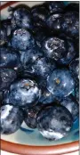  ?? PHOTO BY BETTE BANJACK ?? The United States grows 40% of the world’s supply of cultivated blueberrie­s.