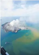  ?? Photo / Bay of Plenty Times ?? An aerial view of the island after last year’s disastrous eruption.
