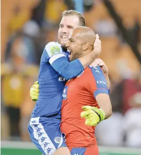  ?? Picture: Gallo Images ?? ELATION. SuperSport United’s Jeremy Brockie and Reyaad Pieterse celebrate after knocking out Kaizer Chiefs in the quarterfin­als of the Nedbank Cup at FNB Stadium on Saturday night.