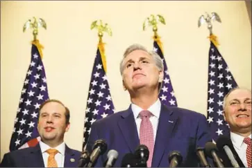  ?? Chip Somodevill­a Getty Images ?? REP. KEVIN McCARTHY speaks to reporters after his Republican colleagues chose him to become the House minority leader in the next Congress. A previous bid to lead the GOP caucus, as speaker, fell short.