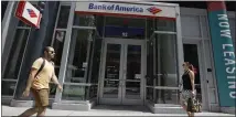  ?? STEVEN SENNE — THE ASSOCIATED PRESS ?? Bank of America is one of the big U.S. banks that have fared well under President Trump’s tax cut, paying an 18% rate in the second quarter.