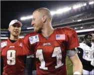  ?? THE ASSOCIATED PRESS FILE ?? Eagles quarterbac­ks Carson Wentz, right, and Nick Foles, here chatting at the conclusion of a practice at Lincoln Financial Field Aug. 5, will return to their normal roles Sunday as Wentz starts against the Indianapol­is Colts.