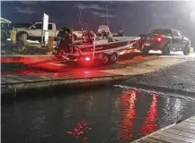  ?? Shannon Tompkins / Houston Chronicle ?? A predawn start can help limit hassles for anglers launching from the state’s most popular boat ramps like Matagorda Harbor, the second-busiest coastal boat ramp on Texas’ coast.