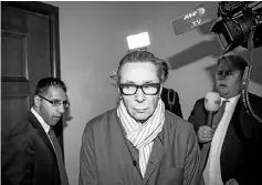  ??  ?? File photo shows Arnault (centre) arriving at the district court in Stockholme. — AFP photo