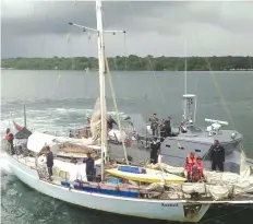  ?? — AFP ?? LAPARAN, Philippine­s: This undated handout photo shows navy personnel aboard the yatch Rockall after it was recovered in Laparan island in Sulu province in the southern island of Mindanao. Islamic militants who specialize in kidnapping for ransom have...